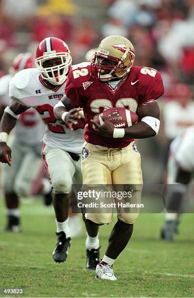 Davy Ford of the Florida State Seminoles carries the ball during the game against the North Carolina State Wolfpack at the Doke Campbell Stadium in...