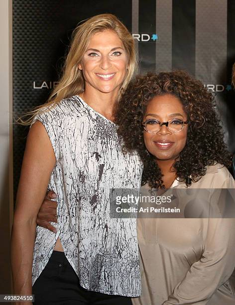 Professional volleyball player Gabrielle Reece and Oprah Winfrey attend the launch of Laird Apparel by Laird Hamilton at Ron Robinson on October 22,...