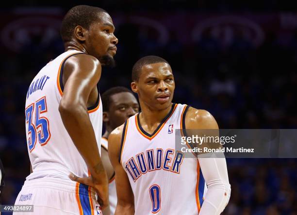 Kevin Durant and Russell Westbrook of the Oklahoma City Thunder look on after a call in the second quarter against the San Antonio Spurs during Game...
