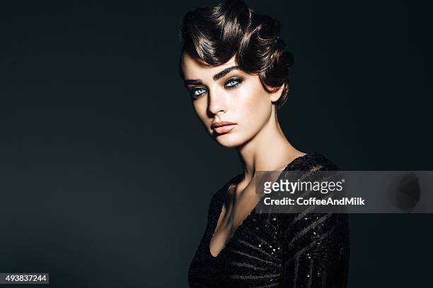studio shot of young beautiful woman - vintage fashion stock pictures, royalty-free photos & images