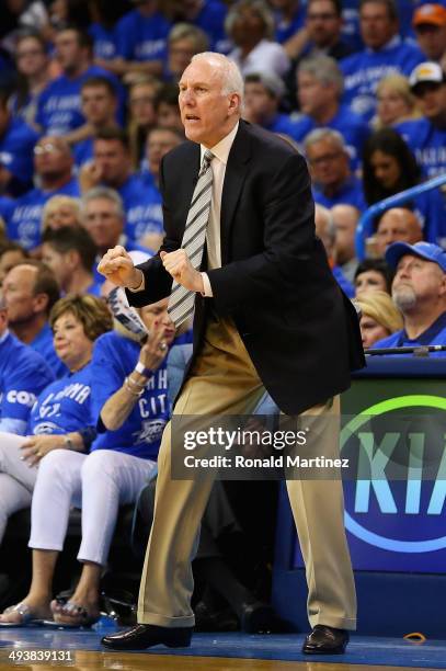 Head coach Gregg Popovich of the San Antonio Spurs looks on in the first half against the Oklahoma City Thunder during Game Three of the Western...