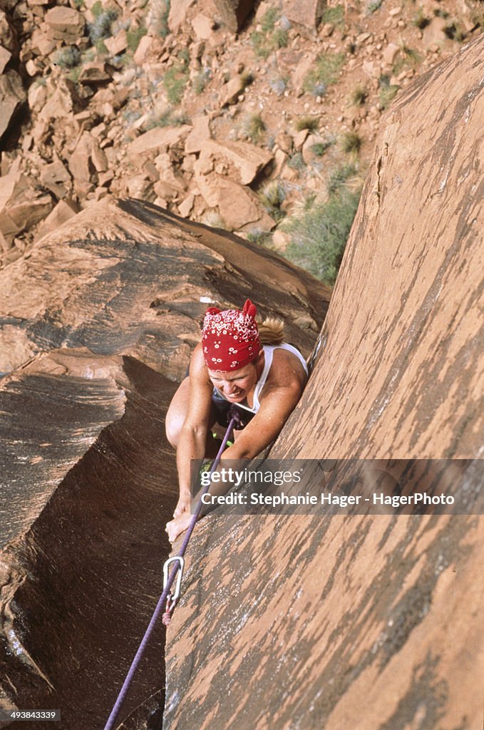 Woman rock climbing
