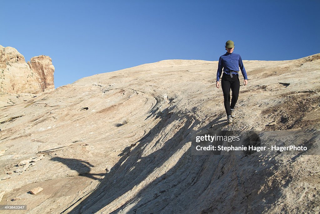 Woman hiking in rock