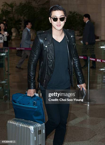 Super Junior are seen at Gimpo International Airport on May 22, 2014 in Seoul, South Korea.