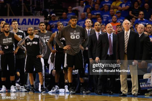 Head coach Gregg Popovich of the San Antonio Spurs looks on with his team in the second half against the Oklahoma City Thunder during Game Three of...