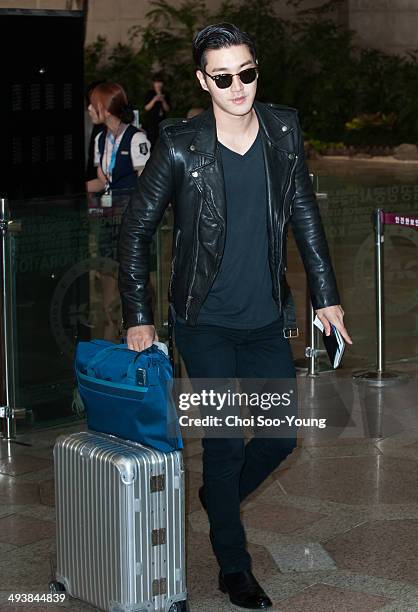 Super Junior are seen at Gimpo International Airport on May 22, 2014 in Seoul, South Korea.