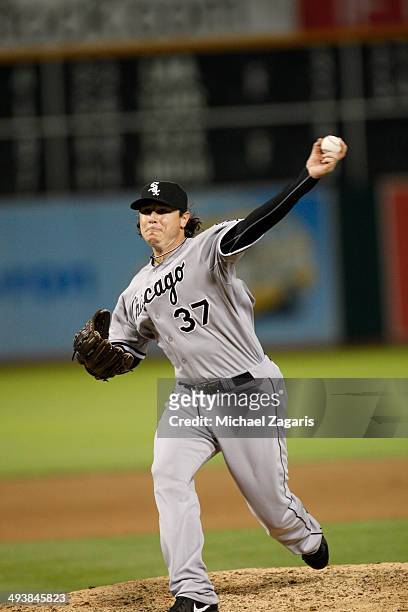 Scott Downs of the Chicago White Sox pitches during the game against the Oakland Athletics at O.co Coliseum on May 12, 2014 in Oakland, California....