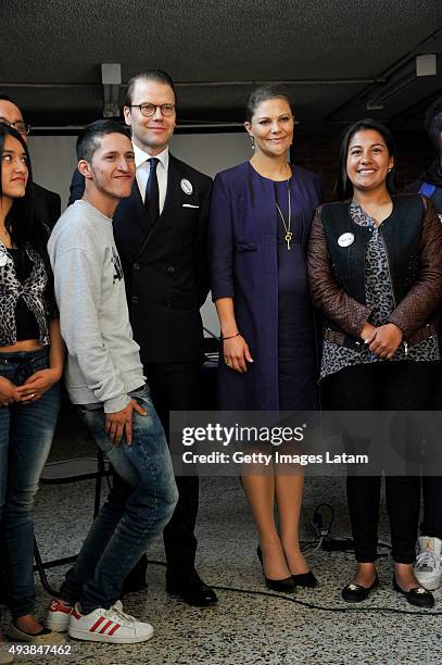 Crown Princess Victoria of Sweden and Prince Daniel of Sweden pose for a picture with youngsters during a visit to the enterprise driven project...