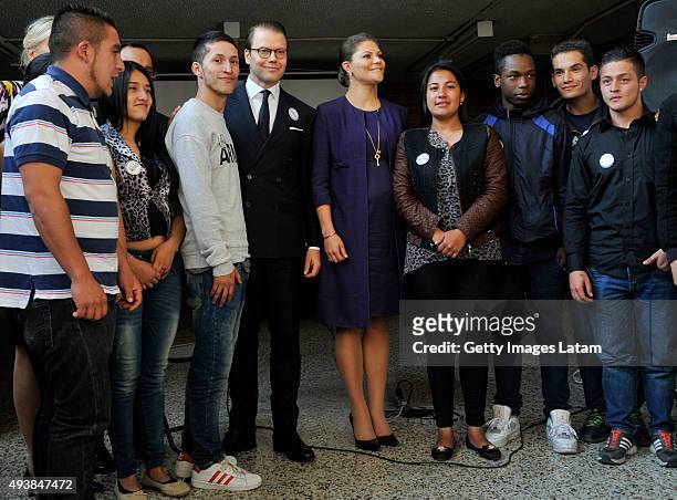 Crown Princess Victoria of Sweden and Prince Daniel of Sweden pose for a picture with youngsters during a visit to the enterprise driven project...