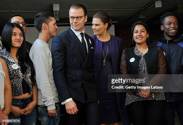 Crown Princess Victoria of Sweden and Prince Daniel of Sweden pose for a picture with youngsters during a visit to the enterprise driven project...