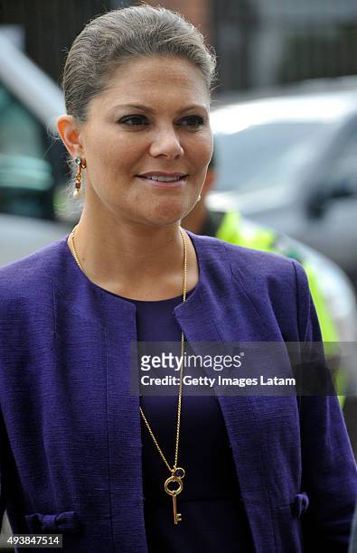 Crown Princess Victoria of Sweden gestures during a visit to the enterprise driven project 'Ruta Motor' on October 22, 2015 in Bogota, Colombia.