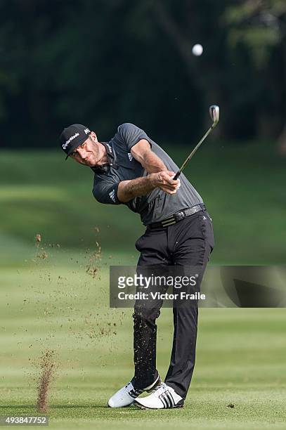Dustin Johnson of USA plays a shot on the 15th hole during the second round of the UBS Hong Kong Open at the Hong Kong Golf Club on October 23, 2015...