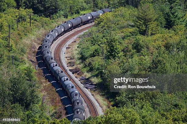 railroad unit train with tank cars - niagara escarpment stock pictures, royalty-free photos & images