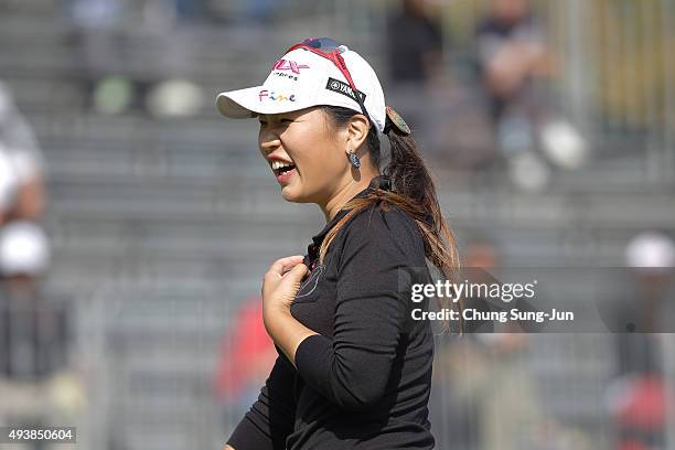 Au-reum Hwang of South Korea reacts after a putt on the 18th green during the second round of the Nobuta Group Masters GC Ladies at the Masters Gold...