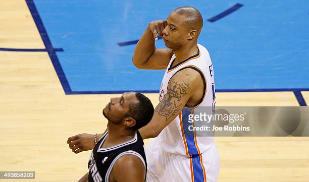 Caron Butler of the Oklahoma City Thunder reacts after a play in the second half against the San Antonio Spurs during Game Three of the Western...