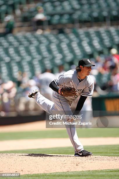 Scott Downs of the Chicago White Sox pitches during the game against the Oakland Athletics at O.co Coliseum on May 14, 2014 in Oakland, California....