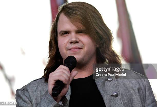 American Idol Season 13 Winner Caleb Johnson performs at the 25th National Memorial Day Concert at U.S. Capitol, West Lawn on May 25, 2014 in...
