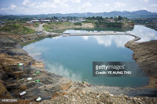 To go with Myanmar-China-mining-economy-politics-resources by Kelly MACNAMARA, Phyo Hein KYAW This photo taken on October 4, 2015 shows a general...