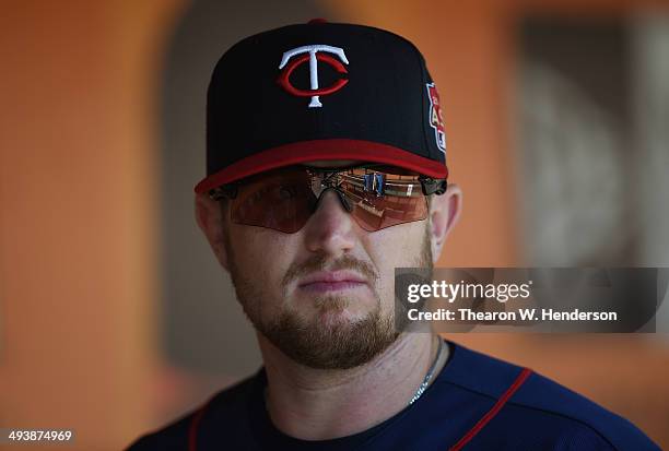 Chris Parmelee of the Minnesota Twins looks on from the dugout prior to the start of his game against the San Francisco Giants at AT&T Park on May...