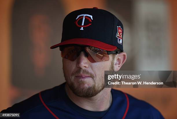 Chris Parmelee of the Minnesota Twins looks on from the dugout prior to the start of his game against the San Francisco Giants at AT&T Park on May...