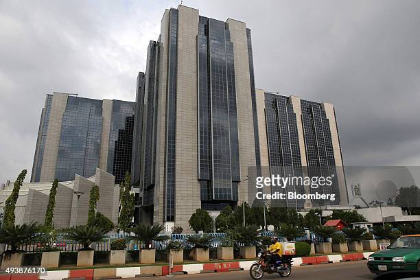 The headquarters of the Nigerian central bank stands in Abuja, Nigeria, on Wednesday, Oct. 21, 2015. A drop in crude prices in the past year has put...