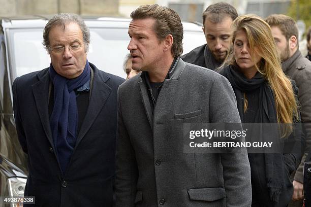 French television show host Benjamin Castaldi and French comedian Daniel Russo attend the funeral ceremony for late French actress and movie producer...
