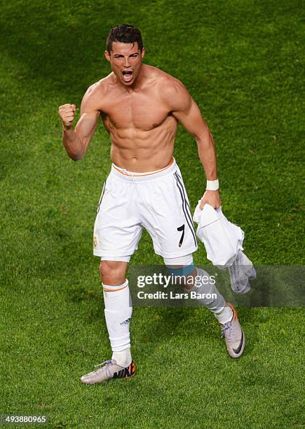 Cristiano Ronaldo of Real Madrid celebrates as he scores their fourth goal during the UEFA Champions League Final between Real Madrid and Atletico de...