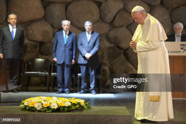 In this handout provided by the Israeli Government Press Office , Pope Francis visits the Yad Vashem Holocaust Museum with Israeli President Shimon...