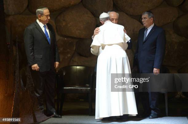 In this handout provided by the Israeli Government Press Office , Pope Francis visits the Yad Vashem Holocaust Museum with Israeli President Shimon...