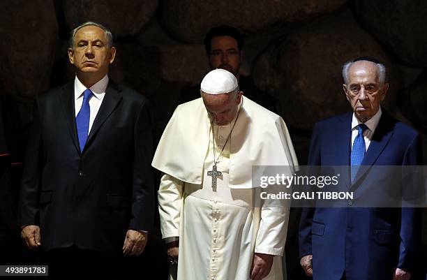 Pope Francis stands alongside Israeli President Shimon Peres and Israeli Prime Minister Benjamin Netanyahu at the Hall of Remembrance on May 26...