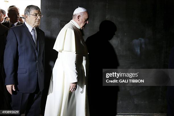 Yad Vashem Chairman, Avner Shalev , and Pope Francis arrive at the Hall of Remembrance on May 26, 2014 during a visit to Yad Vashem Holocaust...