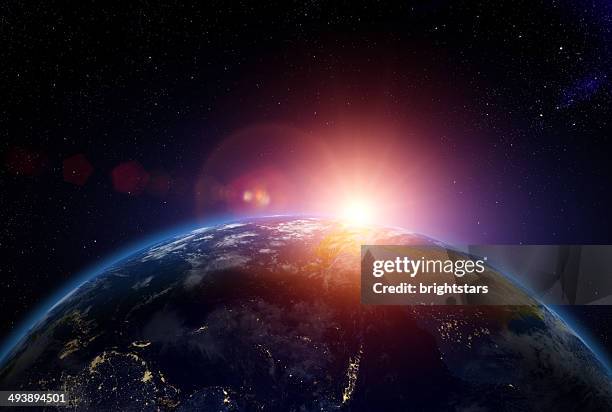 sunrise over australia from space - australia from space stock pictures, royalty-free photos & images