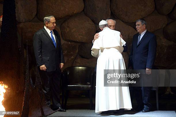 Pope Francis' visit to the Yad Vashem Holocaust Museum in Jerusalem, with Israeli President Shimon Peres and Prime Ministrer Benjamin Netanyahu on...