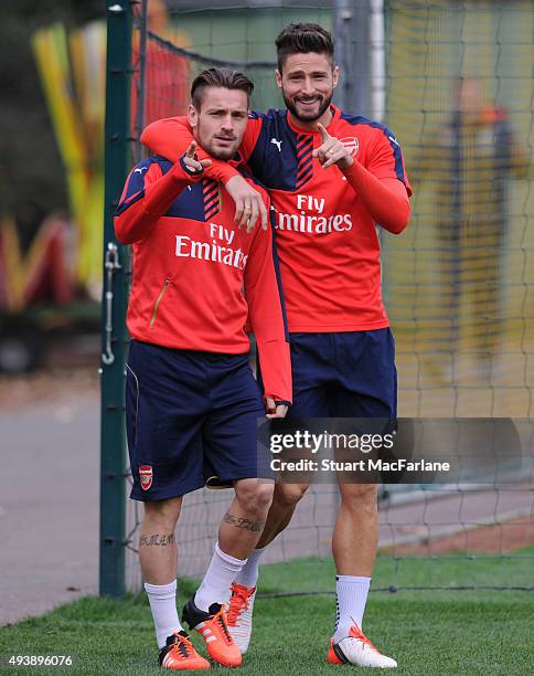 Mathieu Debuchy and Olivier Giroud of Arsenal before a training session at London Colney on October 23, 2015 in St Albans, England.