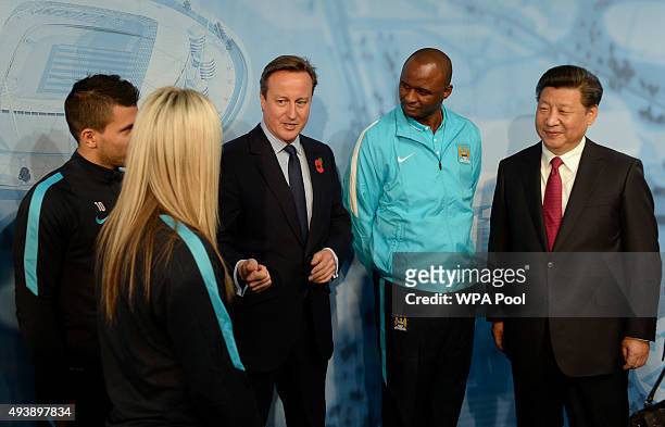 China's President Xi Jinping and Britain's Prime Minister David Cameron meet Manchester City's Sergio Kun Aguero , Manchester City Women's Toni...