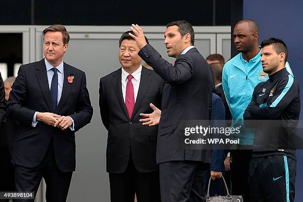 Britain's Prime Minister David Cameron, China's President Xi Jinping, Manchester City chairman Khaldoon Al Mubarak, head of the Elite Development...