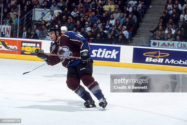 Adam Deadmarsh of the Colorado Avalanche skates on the ice during an NHL game against the Toronto Maple Leafs on February 17, 2001 at the Air Canada...