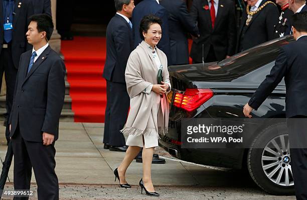 Peng Liyuan, wife of China's President Xi Jinping leaves Manchester Town Hall on October 23, 2015 in Manchester, England. The President of the...