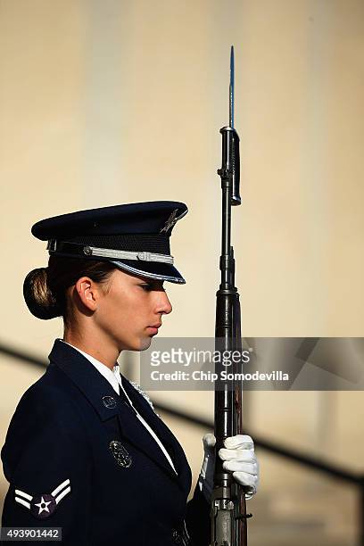 Female U.S. Air Force Airman First Class is part of an honor cordon that welcomed Qatar Minister of State for Defense Affairs Hamad bin Ali Al...
