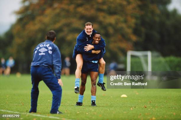 England player Paul Gascoigne gets a lift off Ian Wright during an England training session at Bisham Abbey on October 15, 1990 in Bisham Abbey,...