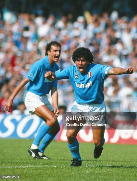 Napoli SSC player Diego Maradona celebrates a goal during an Italian League match between Napoli SSC and AC Milan at San Paolo Stadium in Naples,...