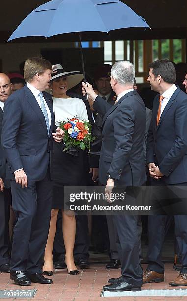 King Willem-Alexander of the Netherlands and Queen Maxima of the Netherlands are pictured while leaving the AUDI eGas research facility on May 26,...