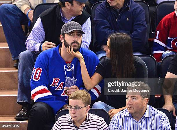 Matt Harvey and Asha Leo attend Montreal Canadiens vs New York Rangers playoff game at Madison Square Garden on May 25, 2014 in New York City.