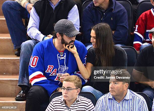 Matt Harvey and Asha Leo attend Montreal Canadiens vs New York Rangers playoff game at Madison Square Garden on May 25, 2014 in New York City.