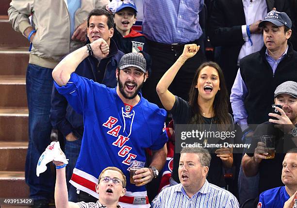 Matt Harvey and Asha Leo attend Montreal Canadiens vs New York Rangers playoff game at Madison Square Garden on May 25, 2014 in New York City.