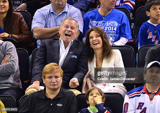 Helmut Huber and Susan Lucci attend Montreal Canadiens vs New York Rangers playoff game at Madison Square Garden on May 25, 2014 in New York City.