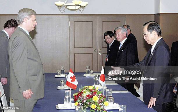 Canadian Prime Minister Stephen Harper and Japanese Prime Minister Yasuo Fukuda are seen prior to their meeting on the sidelines of the G8 Summit on...
