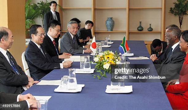 South African President Thabo Mbeki and Japanese Prime Minister Yasuo Fukuda talk during their meeting on the sidelines of the G8 Summit on July 7,...