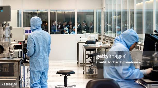 Chancellor of the Exchequer George Osborne and the President of the People's Republic of China Mr Xi Jinping are given a tour of the National...