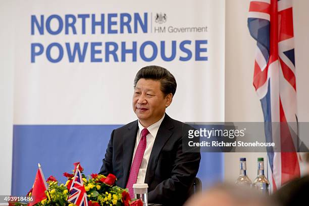 The President of the People's Republic of China Mr Xi Jinping tours the National Graphene Institute at Manchester University with the Chancellor of...